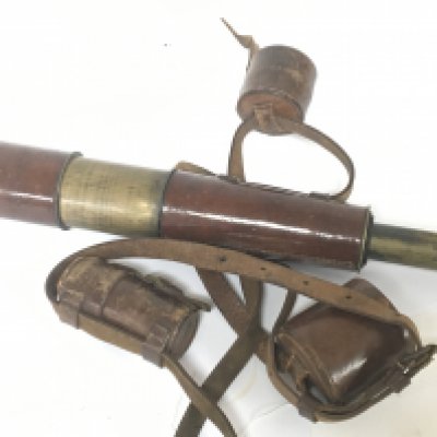 A British Military I world telescope brass with leather casing in very good condition maker Beck of London 1915 with military marks