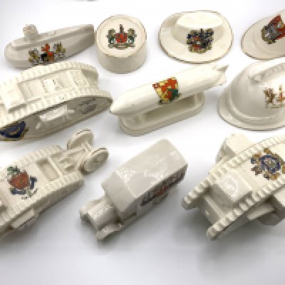 12 military related crested china ornaments. (2 with damage).