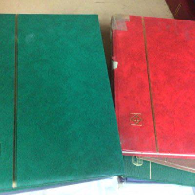 A collection of 11 albums of mint / used world postage stamps