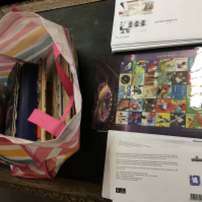 A collection of stamp albums and loose stamps. Postage C