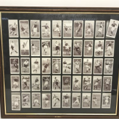 A framed collection of vintage Churchmans Cigarettes football cards, dimensions 50x46cm. NO RESERVE