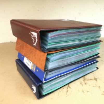 Four albums containing foreign cigarette and trade cards including German Military cards. Postage category C