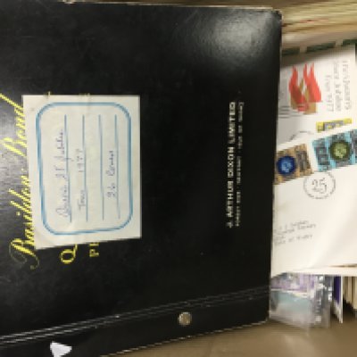 A box containing assorted first day covers and other stamp issues. Postage category C