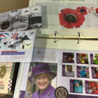 A collection of numismatic first day covers.