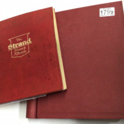 Two stamp albums filled with stamps from around the world and some loose stamps.