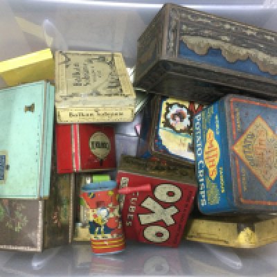 A box of vintage tins, tin plate rattle etc.