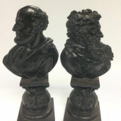 A pair of cast iron figural bookends, approx height 21cm. Shipping category c. NO RESERVE