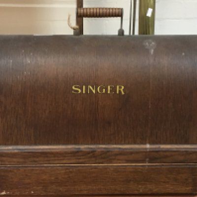 A cased Singer sewing machine, this lot cannot be posted