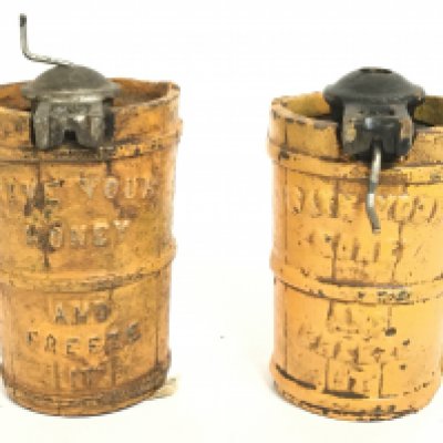 A pair of vintage cast iron ice cream churns, Save Your Money and Freeze it. Approximately 10cm high. Postage category B. NO RESERVE