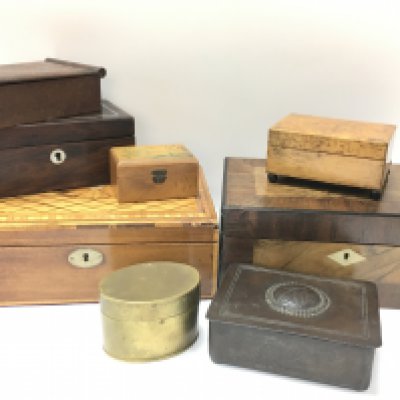 A collection of wooden boxes and other examples ranging in size. Postage category C