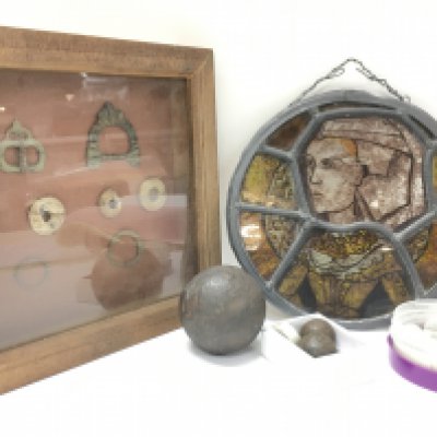 An assortment of Medieval and 17th century items including a panel of a medieval lady