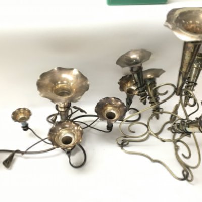 Silver plated table epergnes, one being a Mappin and Webb example. 24 and 44cm tall. Postage category C