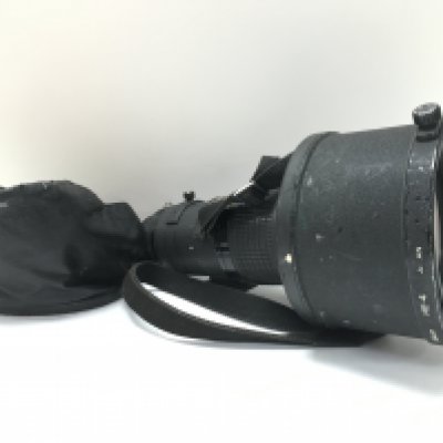 A Nikon 300mm wide angle HE-4. 30cm long. Postage category C