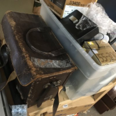 A large collection of varied lenses, camera accessories and cameras including a Boxed Nikon D3400, A Nikon F3, F4 etc. This lot cannot be posted