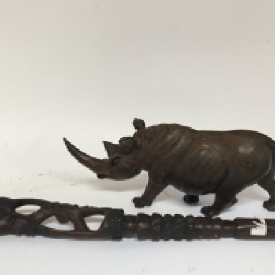 A carved hardwood possible lignam vitae and carved hardwood tribal stick (2)