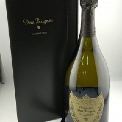 A vintage 2006 Dom Perignon champagne with original packaging. (D)