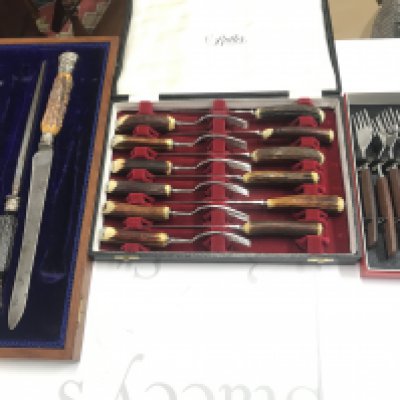 A collection of knife and fork cutlery sets including part carving set in oak case. Postage C