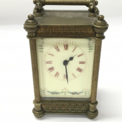 A vintage carriage clock. 11cm by 6cm. NO RESERVE