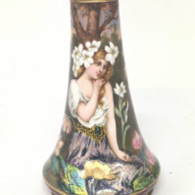 An exceptional quality Art Nouveau Enamel vase depicting a young girl amoungst flowers in a wooded landscape Height 17cm no obvious damage or restoration.