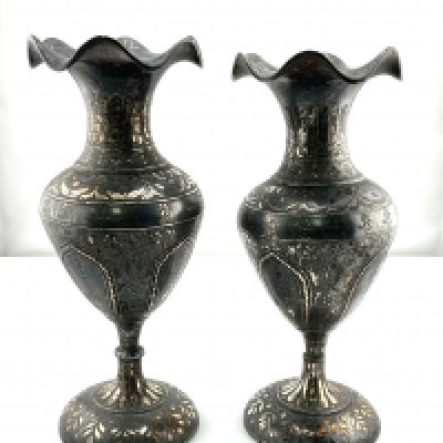 A pair of Persian steel and silver inlaid vases. (C)