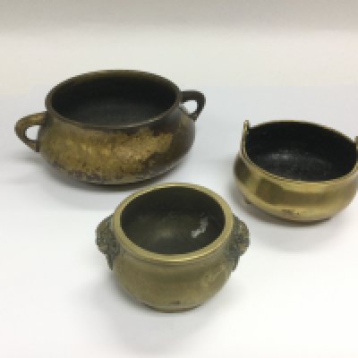 Three bronze censors of squat circular form, the largest diameter approx 10cm. Shipping category B.