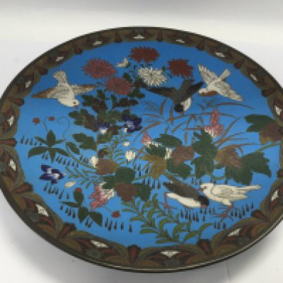 A Cloissone dish decorated with birds, approx diameter 30cm. Shipping category D.