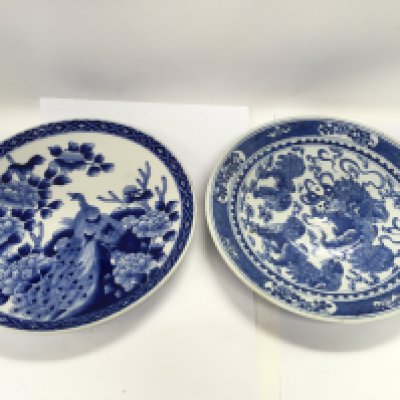 Two blue and white 19th Century Oriental plates, approx diameter 30cm. Shipping category D.