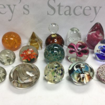 A collection of glass paperweights including boxed and loose paperweights comprising Caithness, Whitefriars, Millefiori and others. Shipping category D.
