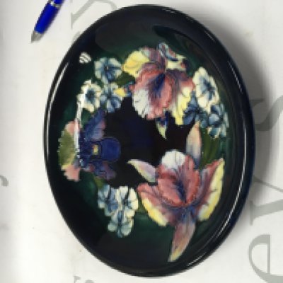 A Moorcroft dish decorated with Hybiscus flowers and foliage 21 cm No damage or restoration.