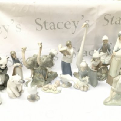 A collection of Lladro and Nao porcelain figures. This lot cannot be posted