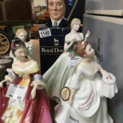 Four Doulton figures a small character jug a boxed English enamel together with two Gaudi plates