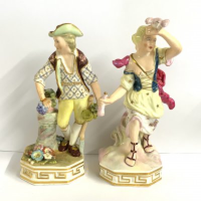 A pair of Derby porcelain figures with Stevenson & Hancock marks.