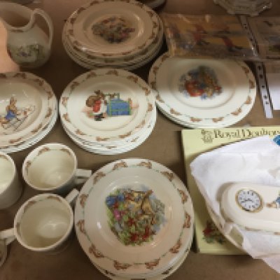 A collection of Royal Doulton Bunnykins including cups saucers and side plates.