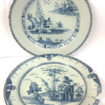 18th century English Delft pottery chinoiserie style blue and white plate together with a similar example. 22.5cm.