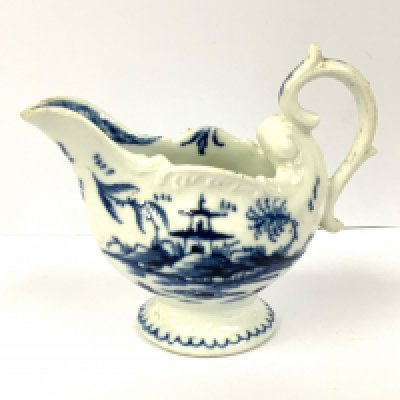 A Derby ewer cream jug, circa 1750, with Underglazed blue oriental pagoda design. 8.5cm.