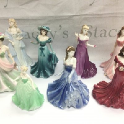 Eight Coalport figures of ladies. Shipping category D.