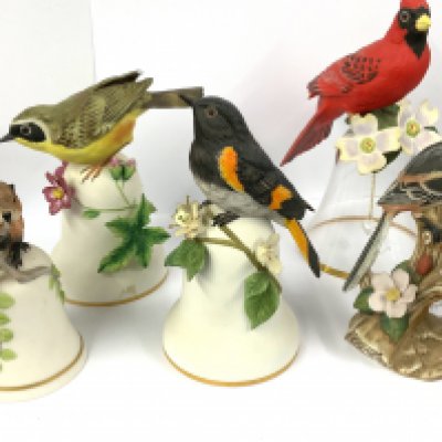 A collection of ceramic and glass bells etc. (D)