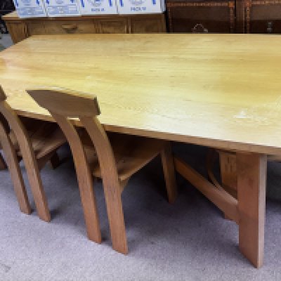 Modern design maple dining table and 8 chairs, together with matching maple sideboard, custom made by Toby Roskilly, each chair marked with engraved stylised man symbol from letters TR. table. 208cm x 103cm. Sideboard 173cm x 90cm x 47cm