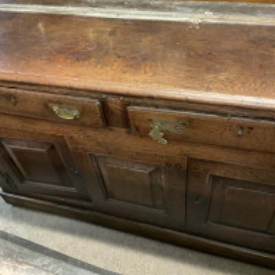 A oak dresser base fitted with two drawers and cupboards. NO RESERVE