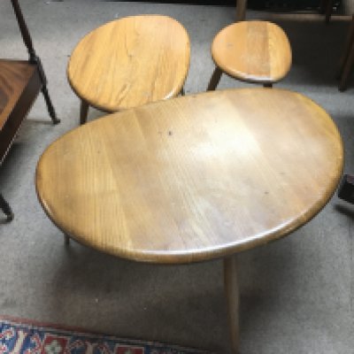A nest of Ercol pebble tables. Tallest 40cm tall ,smallest 32cm tall.
