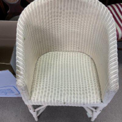 A single Lloyd Loom chair.