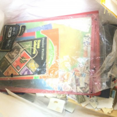 A collection of world stamps including albums and loose. Postage cat B. NO RESERVE