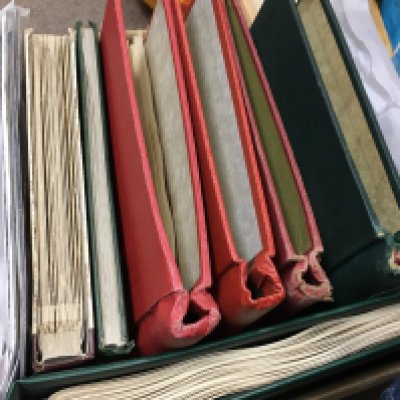 A box of world stamp albums. Postage category C