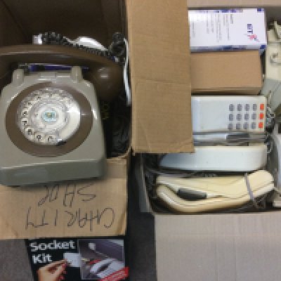 Two boxes of vintage telephones including a rotary dial example. Shipping category D. NO RESERVE