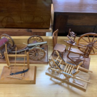 Hand built wooden scale models, English 9 PDR and Limber (canon and trailer), Spinning wheel and stick back chair, Charcole burners mare, Rack, Sithe and Pitch fork. NO RESERVE