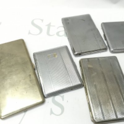 A collection of vintage cigarette cases , postage category B
