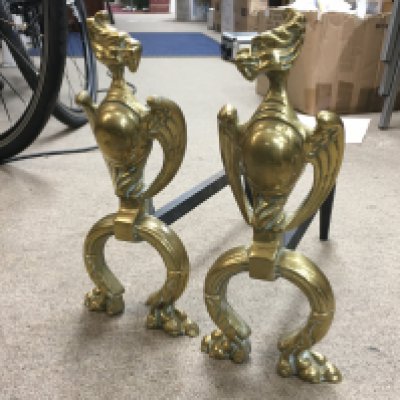 A pair of brass firedogs , postage category C. NO RESERVE