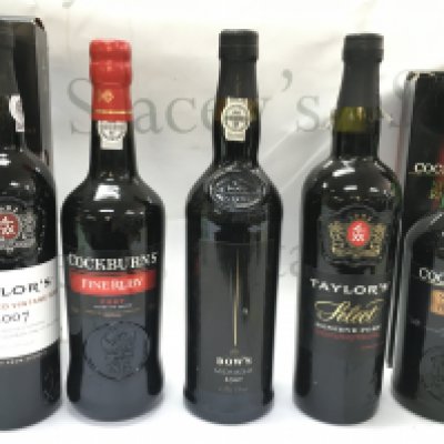 A collection of ports including Taylors 2007, Cockburns fine ruby, Dows Midnight, Taylors select, Cockburns special reserve. This lot cannot be posted