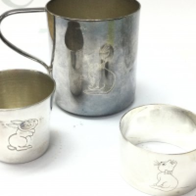 A silver plated christening set . Postage category A