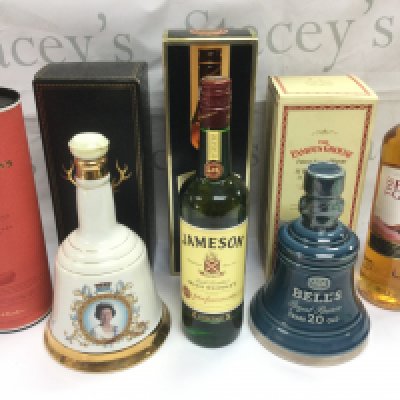 A collection of Whiskeys comprising a 12 year old Dalmore single malt and others.